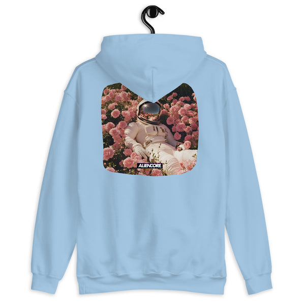 Light blue hoodie with an astronaut and flower design on a hanger against a white background