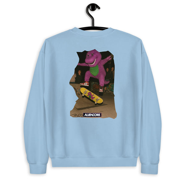 Light blue sweatshirt with a graphic of a purple dinosaur on a skateboard, hanging on a black hanger against a white background.