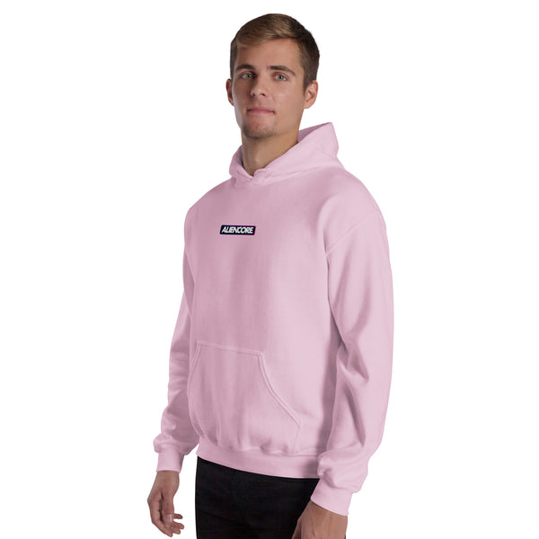 Man wearing a pink hoodie with a brand logo on a white background