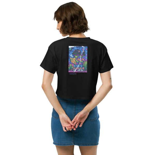 Person wearing a black t-shirt with a colorful graphic on the back, standing against a white background