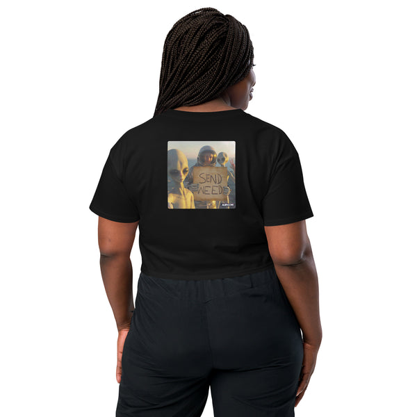 Person wearing a black t-shirt with a graphic on the back, standing against a white background