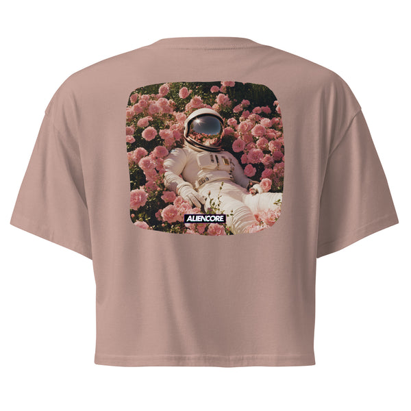 Pink t-shirt with an astronaut in a flower field graphic on the back, brand 'ALENCORE' visible.