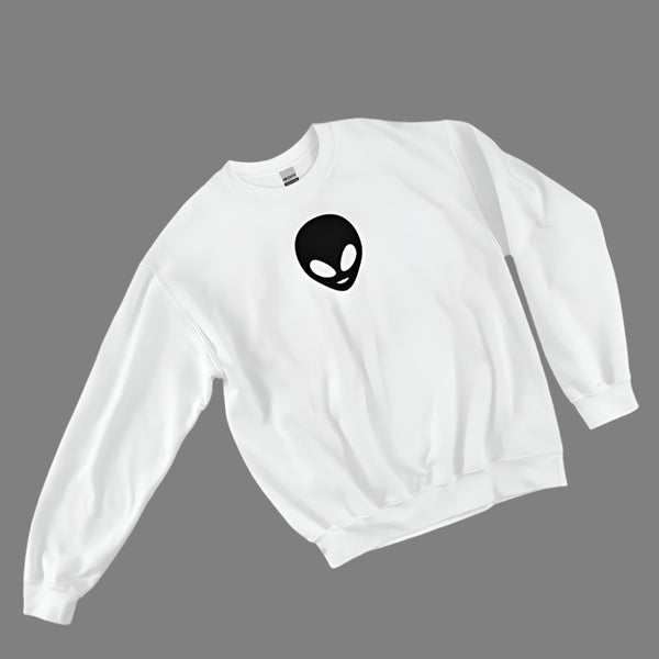 White sweatshirt with a black alien logo on a gray background