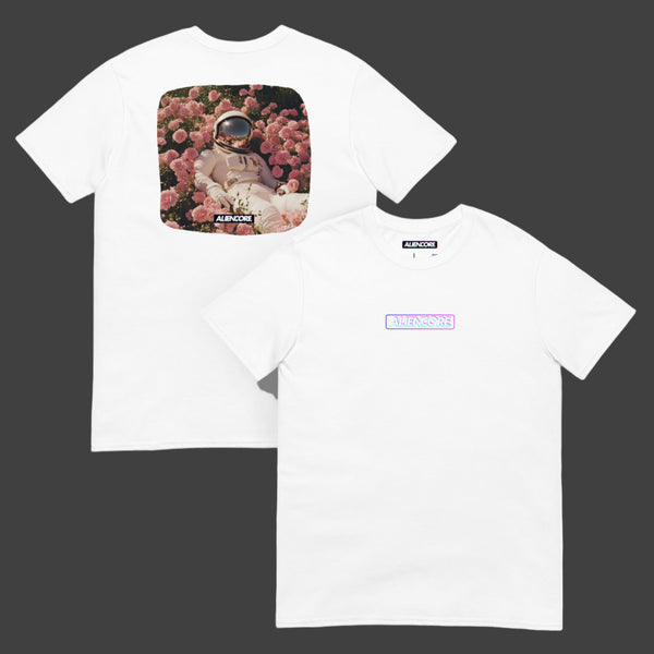 White t-shirt with a graphic of an astronaut in space surrounded by flowers on a white background.