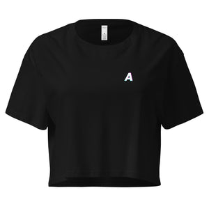 Black crop top with a white logo on a white background