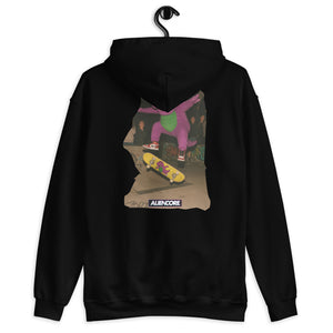 Black hoodie with a graphic of a person skateboarding on the back, hanging on a white background.