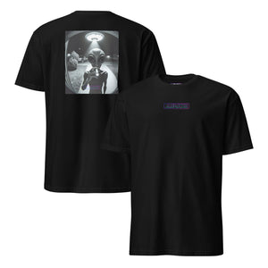 Black t-shirt with alien graphic on the front and text on the back, displayed on a white background.