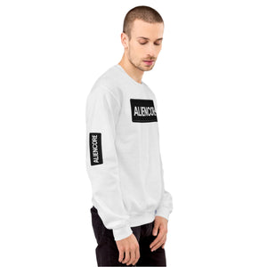 Man wearing a white sweatshirt with 'ALIENCORE' branding against a gray background