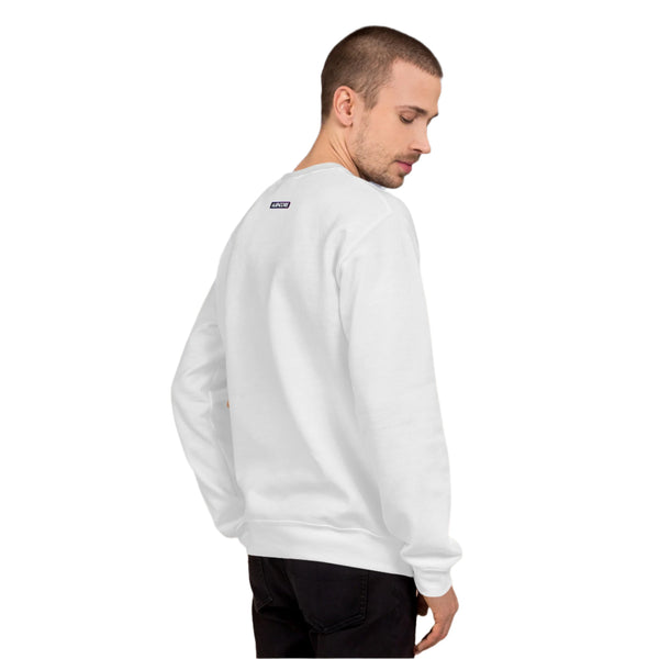Man wearing a white sweatshirt with a logo on the back, standing against a gradient wall.
