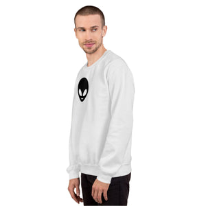 Man wearing a white sweatshirt with an alien logo against a gray and brown background