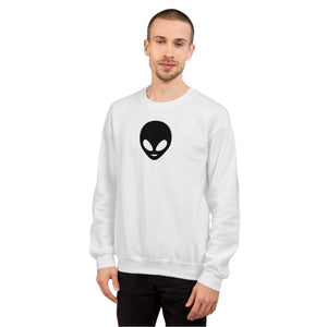 Man wearing a white sweatshirt with an alien logo against a plain background