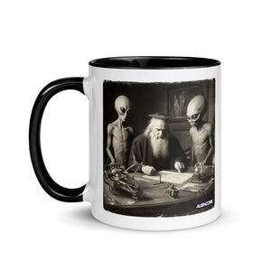 Mug with a black handle featuring a graphic of aliens and a man at a table, with 'Aliencore' branding.