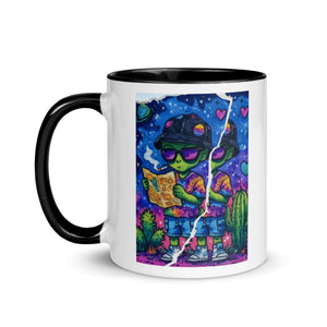 Mug with a colorful design of an alien reading a book, surrounded by plants, on a white background.