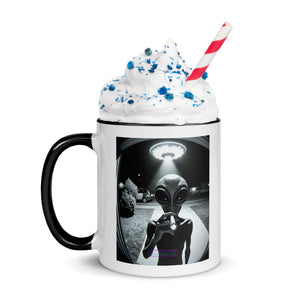 Mug with alien design and whipped cream on a white background