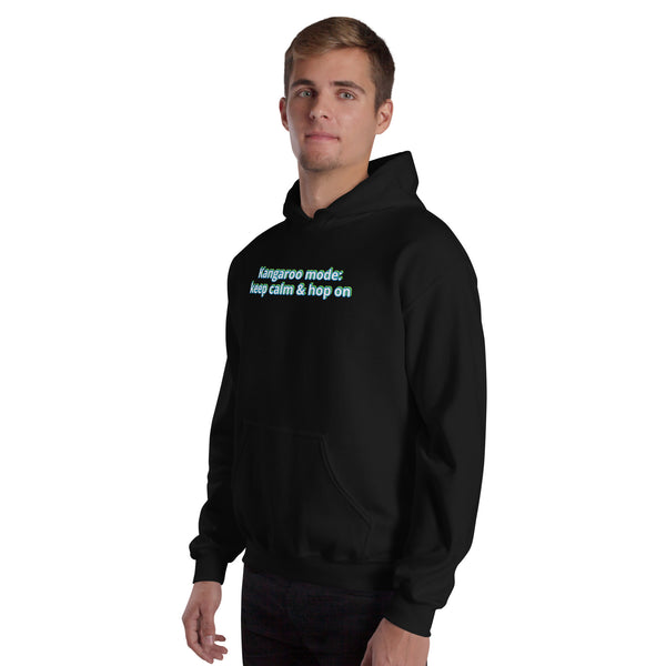 Person wearing a black hoodie with text on a white background