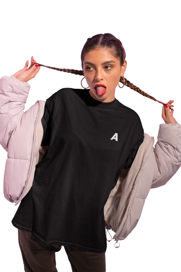 Person wearing a black sweatshirt with a white letter 'A' on a purple background