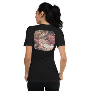 Person wearing a black t-shirt with a graphic design on the back, standing against a white background.