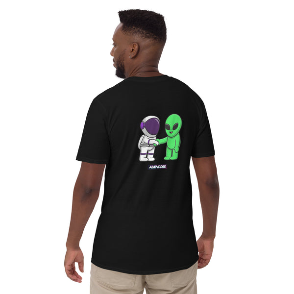 Person wearing a black t-shirt with an alien and astronaut graphic on the back.