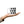White mug with black alien face pattern held in a hand on a white background