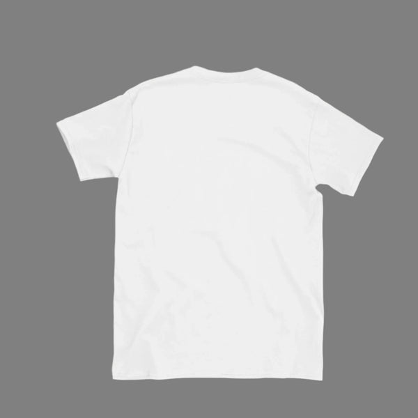White t-shirt on a light gray surface with a camera, phone, and glasses.