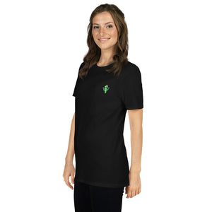 Woman wearing a black t-shirt with a small green logo on a white background