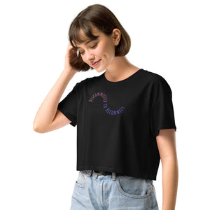 Woman wearing a black t-shirt with text on a white background
